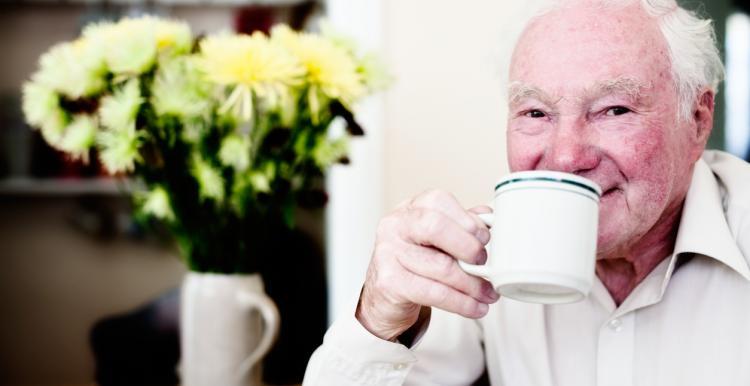 Older man having a coffee 