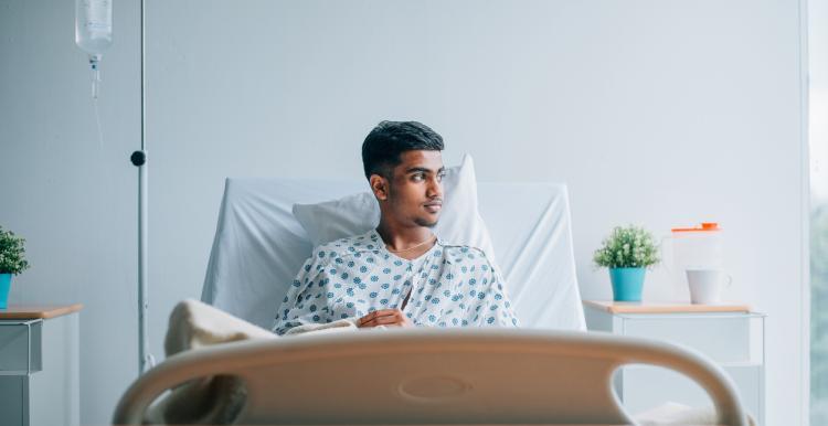 Young person in a hospital bed