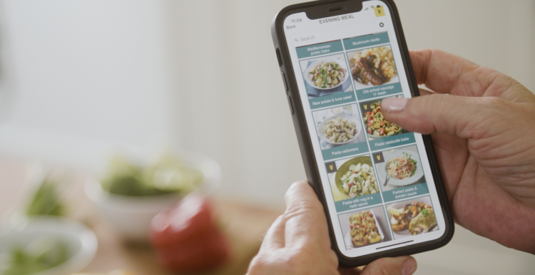 app on phone with healthy recipes