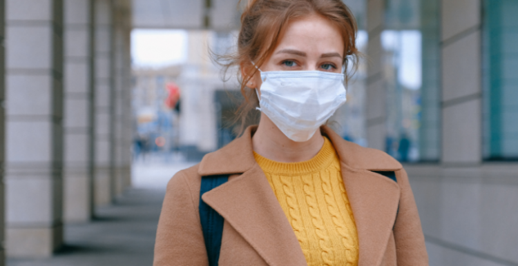 Young woman wearing a face mask 