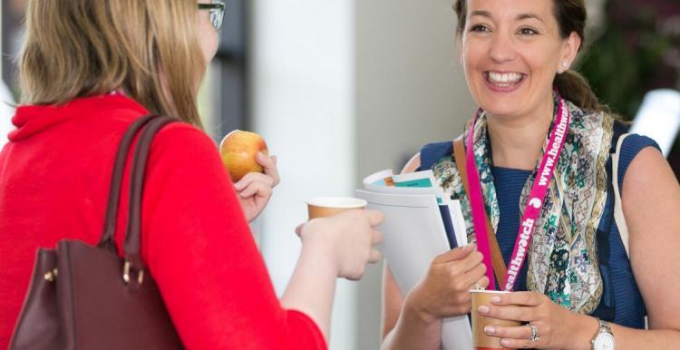 Person talking to Healthwatch staff member 