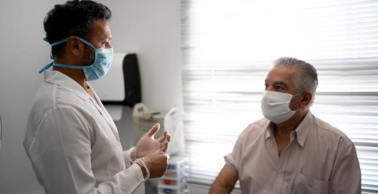 Doctor talking with patient 