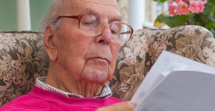 Older man reading 