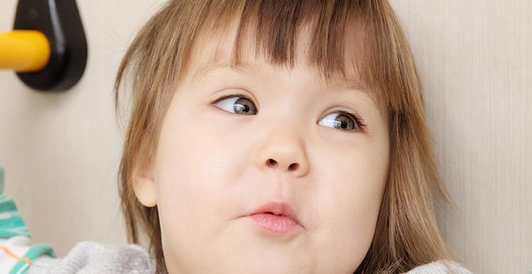 Young child looking away from the camera