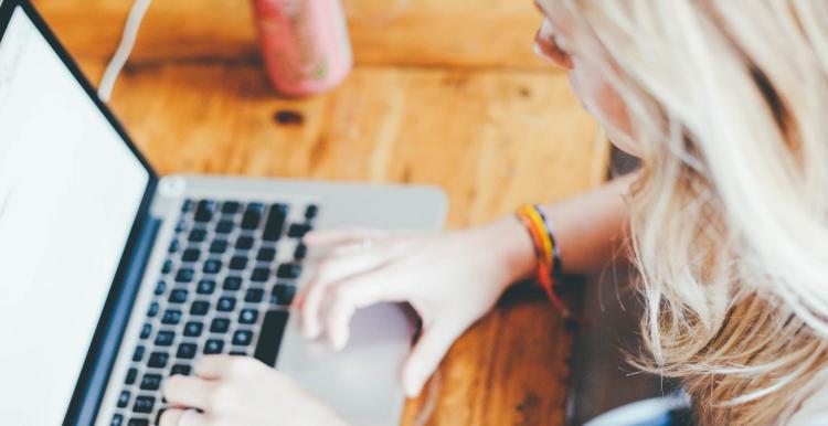 Woman using a computer.