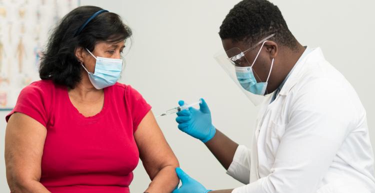 woman having vaccine injection 