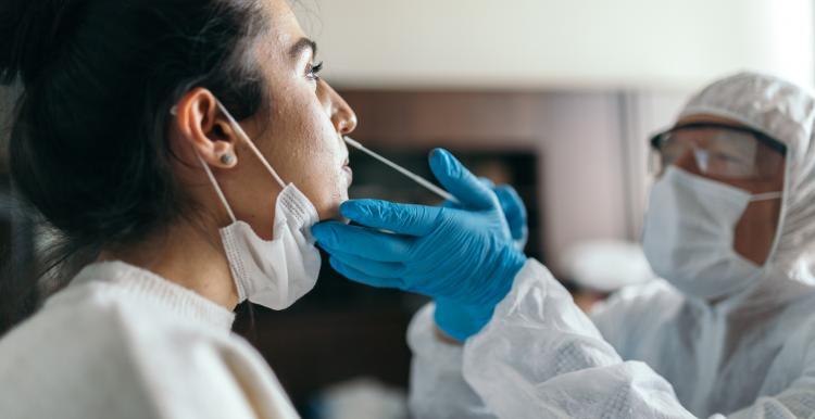 ypoung woman having a covid test 