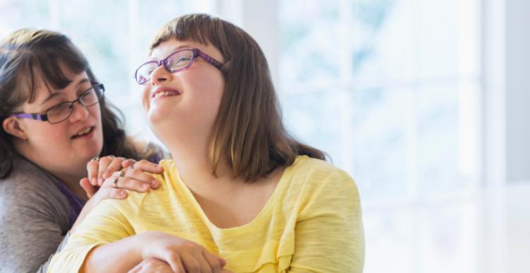 Two young women laughing 