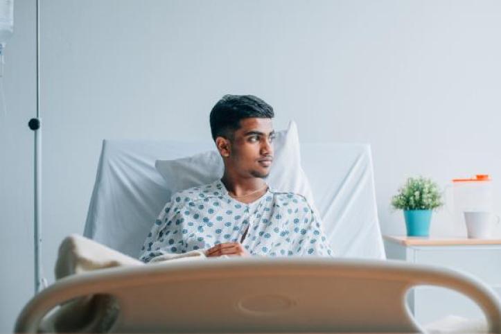 Young person in a hospital bed
