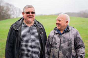 Two men outside 