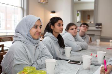 young-people-sat-at-a-table