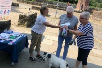 Engagement Officer talking to members of the public 