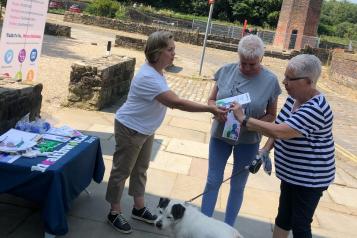 engagement officer taking to members of the public 