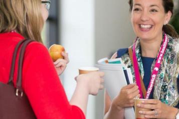 Person talking to Healthwatch staff member 