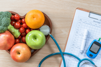 diabetes kit and heart shaped fruit