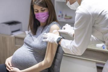 Pregnant person having the flu vaccine 
