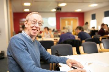 Man sat at a table 