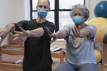Older woman and physiotherapist