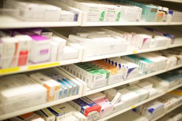 medication on a pharmacy shelf