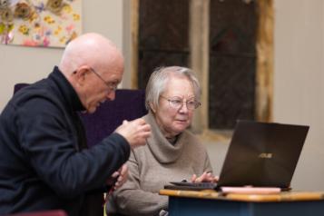 People using a computer.