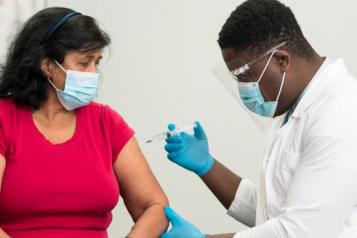 Lady having the vaccine 