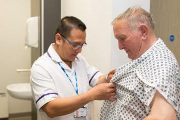 man and health care assistant