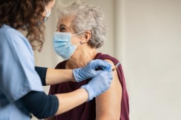 Older lady getting covid vaccine 