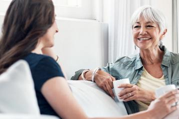 two women talking money