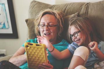 woman-and-girl-using-tablet-computer