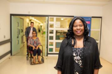 woman-standing-in-hospital-corridor