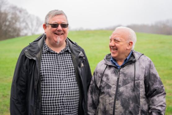 Two men outside 