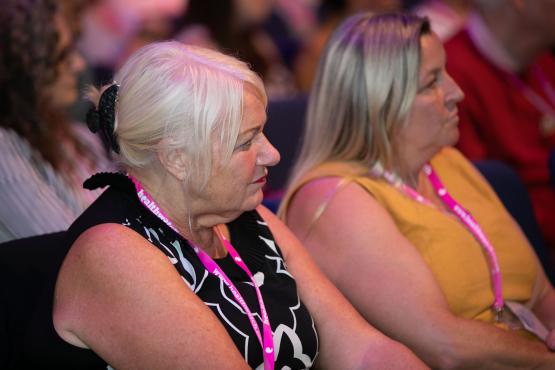 Two Healthwatch staff at a conference